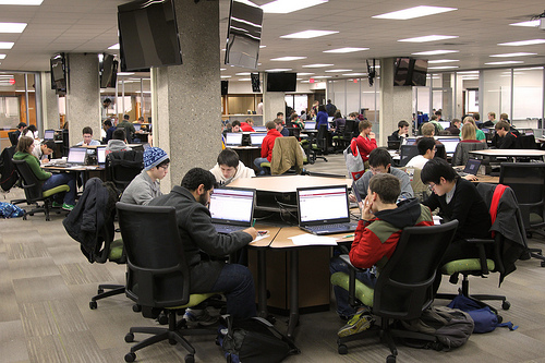 Students work on problem sets. Greg Anderson Photography - CC BY College Library